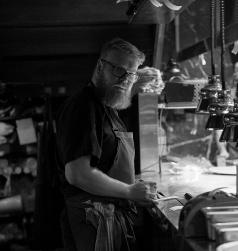 Headshot of Chef Thomas Godfrey smiling professionally